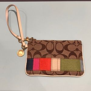 Coach clutch with strap